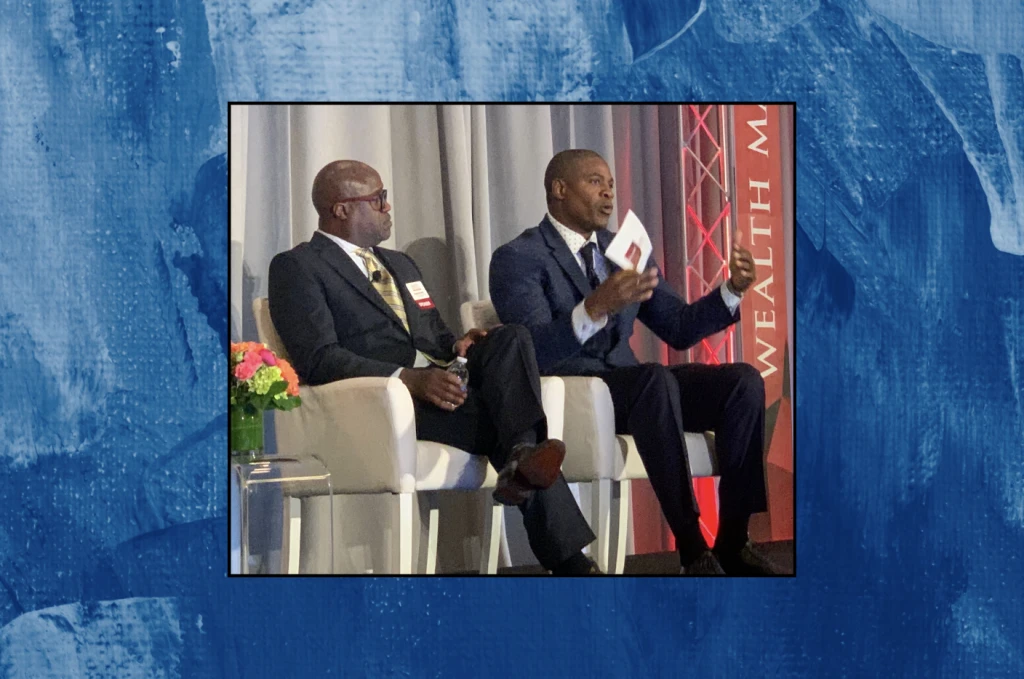 Four men leading a panel discussion at the Quad-A 2024 Vision Conference